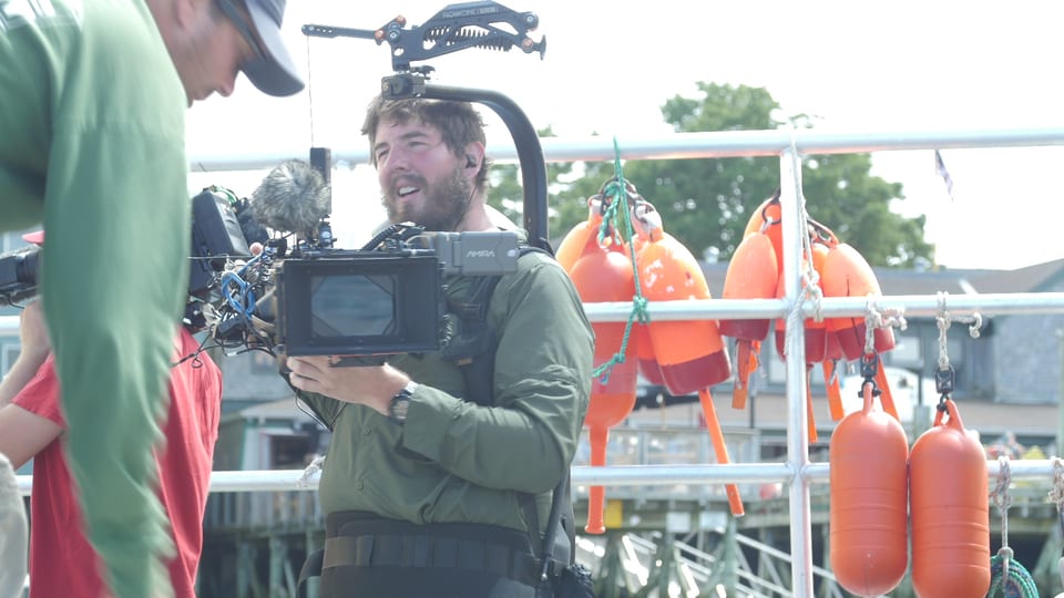 James Peterson filming on the coast
